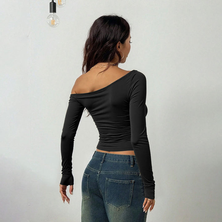 Elegant asymmetrical top for women with refined strap details Chic & Stil
