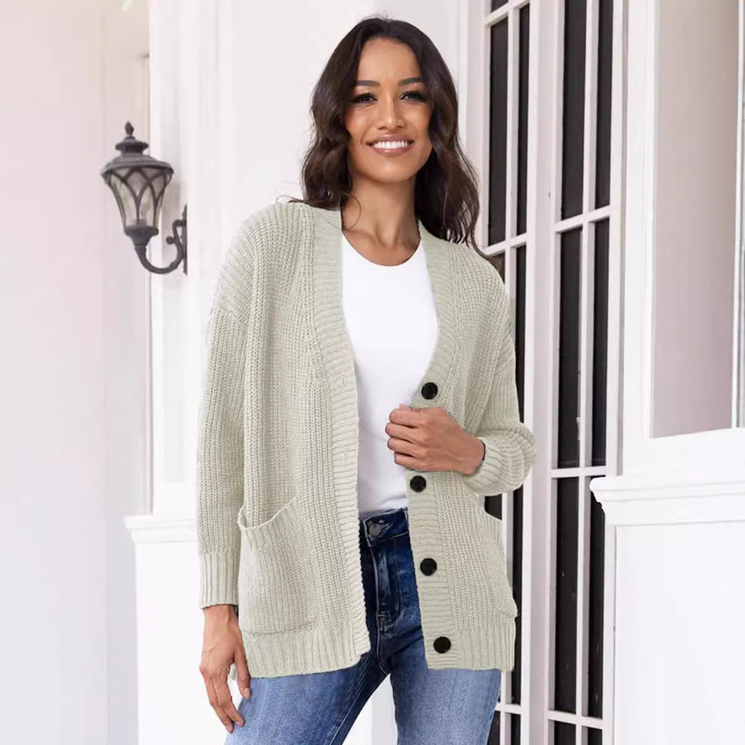 Knitted jacket for women with large pockets and classic button closure Lune London