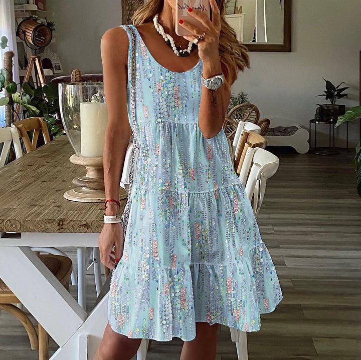 Ladies' airy leisure dress with floating ruffle and playful print Lune London