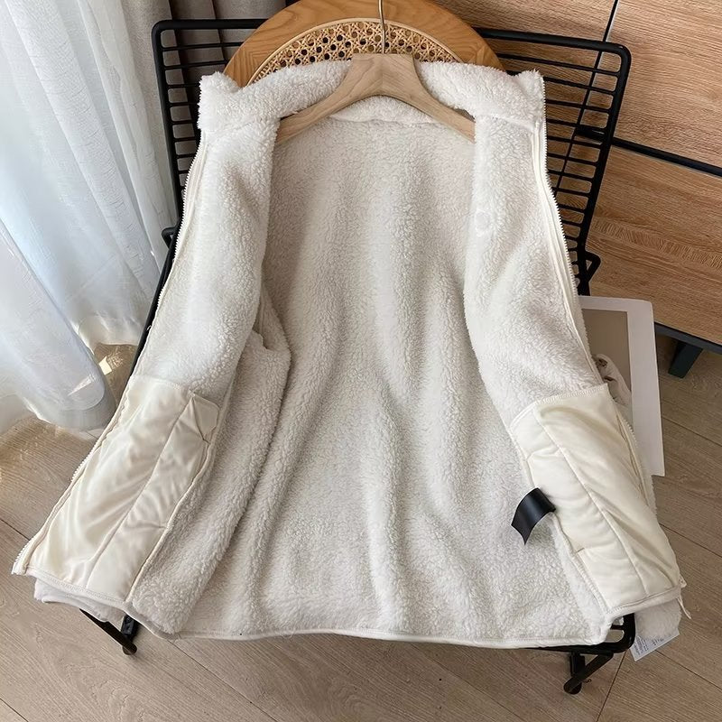 Veste en polaire confortable pour femmes avec col montant et fermeture éclair latérale Chic & Stil
