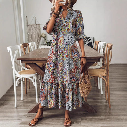 Women's maxi dress with colorful Paisley pattern and fashionable ruffle Lune London