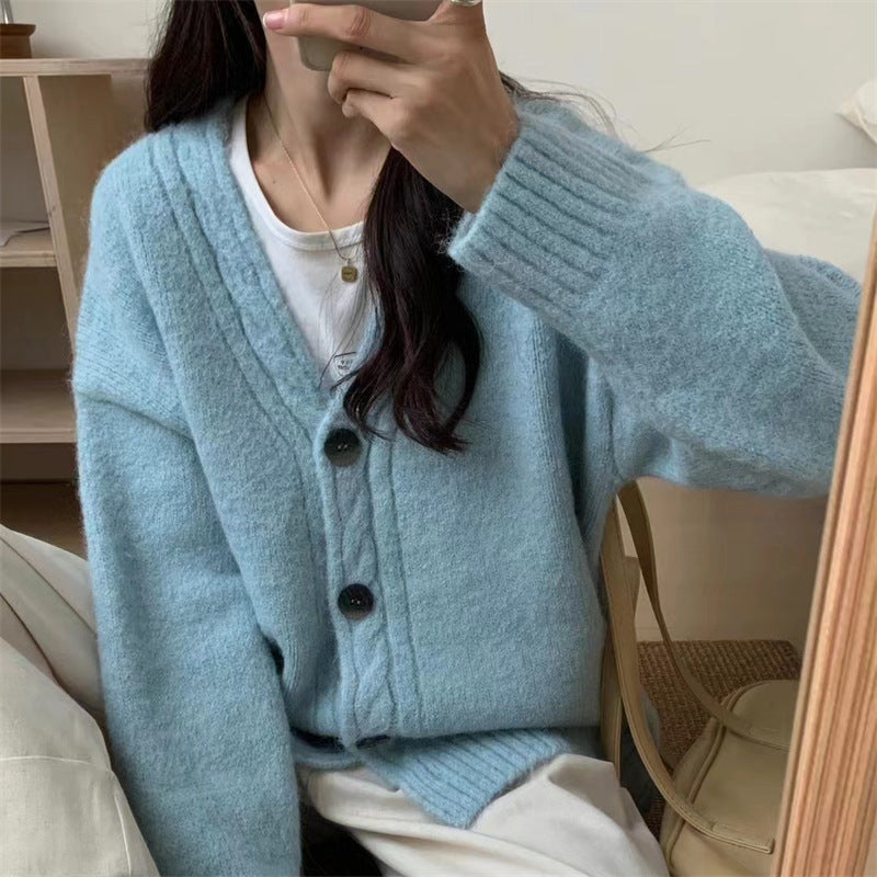 Ladies Comfortable Knit Sweater with an Elegant V Neck and Chic Button Details