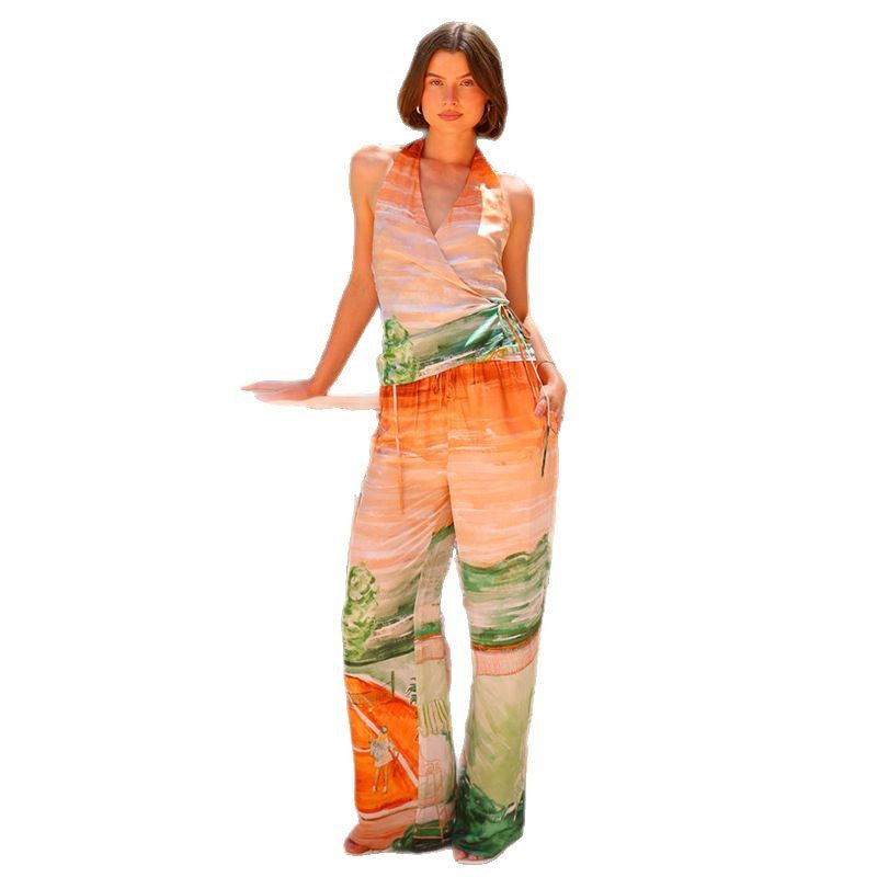 Women’s jumpsuit with deep V neckline and side tie belt Chic & Stil