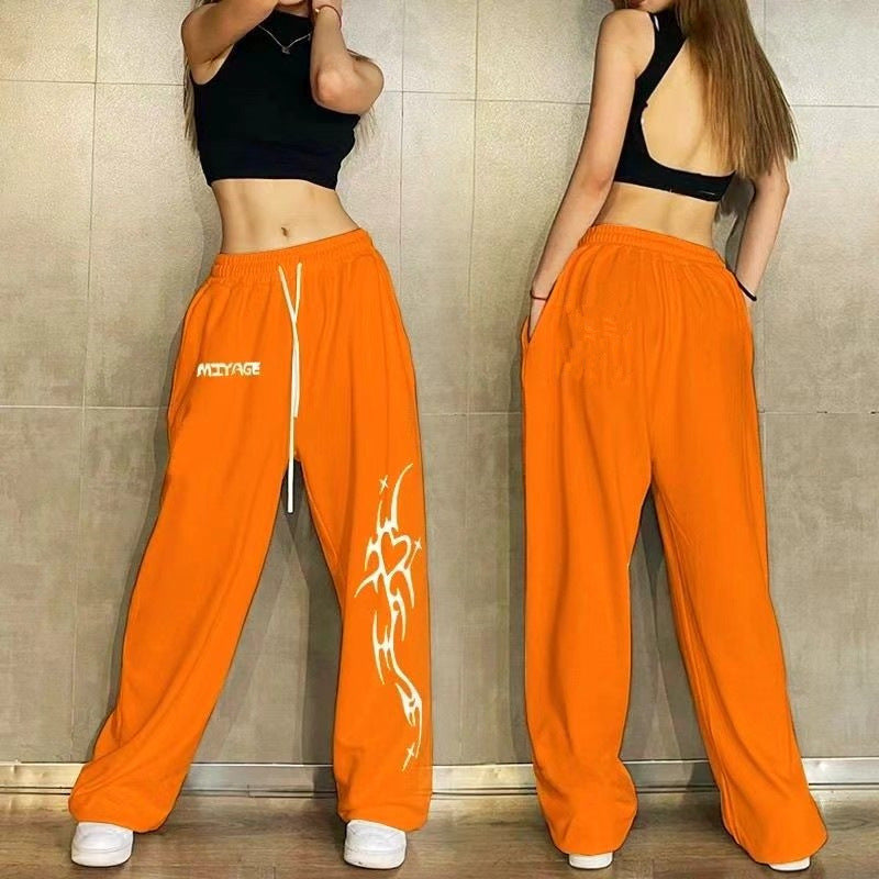 Women's casual leisure pants with a wide cut and striking graphic design Chic & Stil