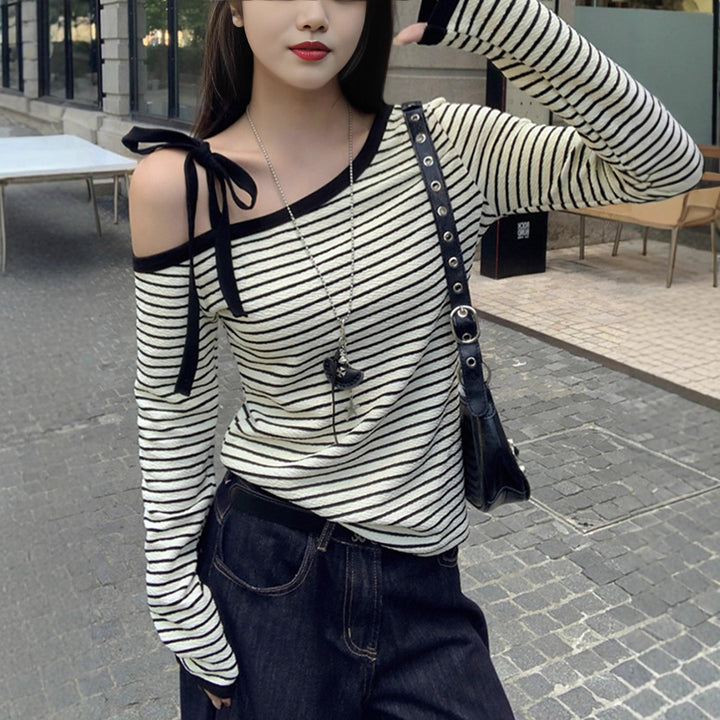 Women's off-shoulder long-sleeve shirt with striped design and decorative bow details Chic & Stil