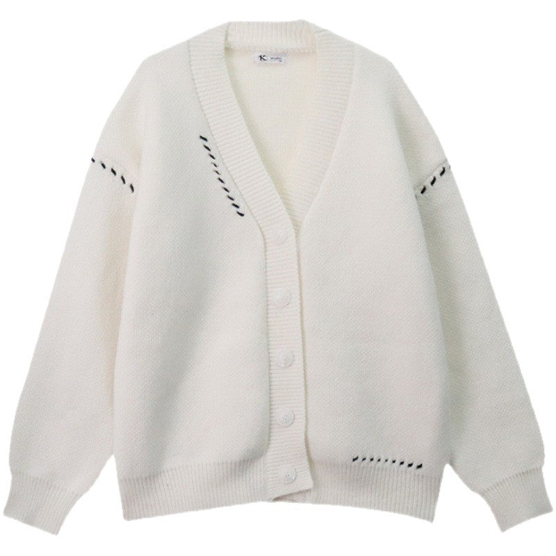 Cardigan tricoté large pour femmes avec détails de boutons et matériau doux Chic & Stil