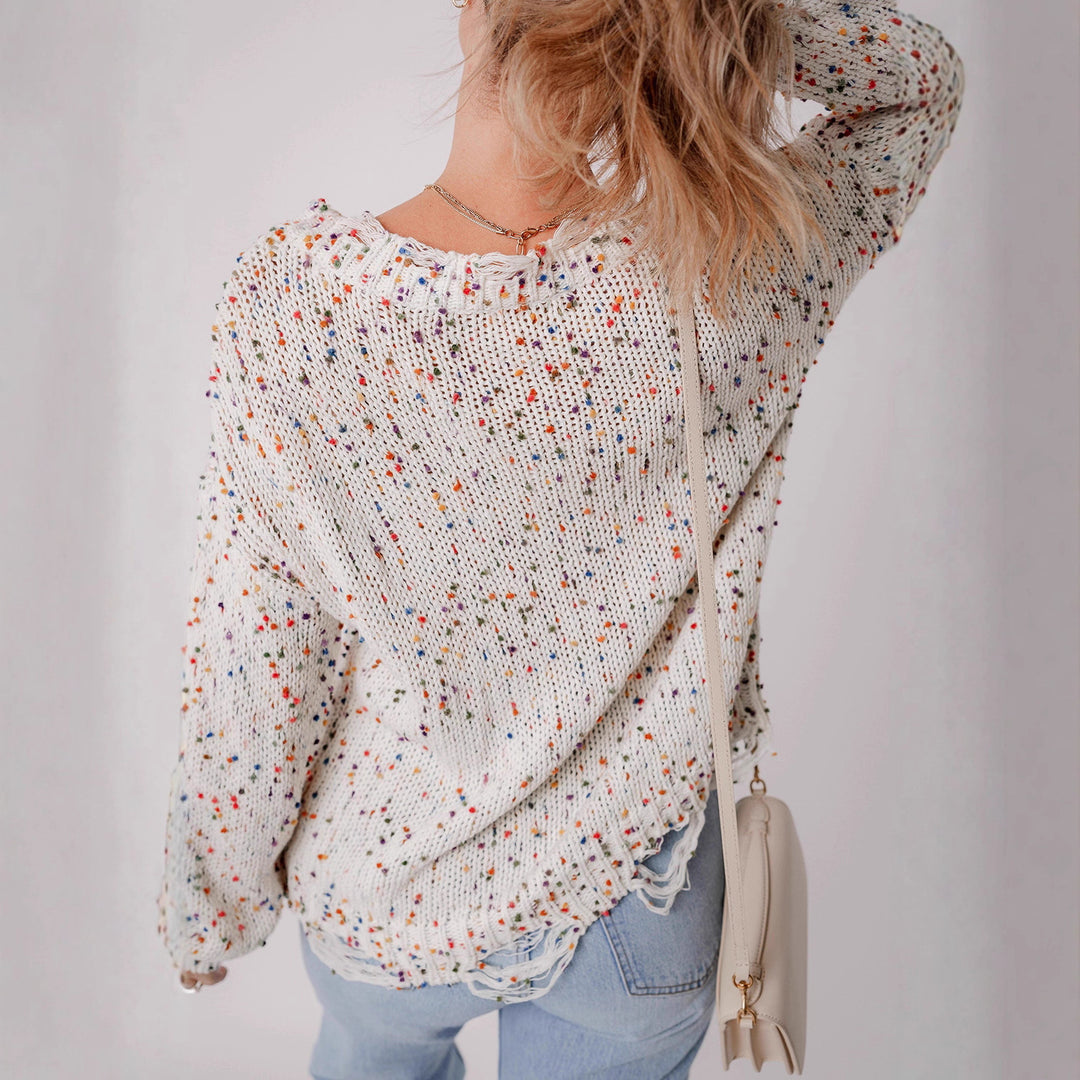 Casual knitted sweater for women with a colorful splatter design and a comfortable round neckline Lune London