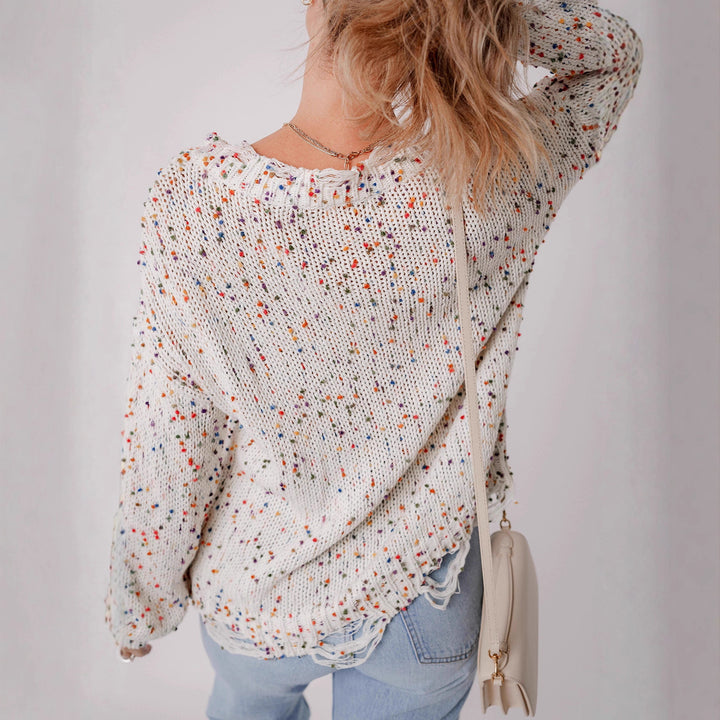 Casual knitted sweater for women with a colorful splatter design and a comfortable round neckline Lune London