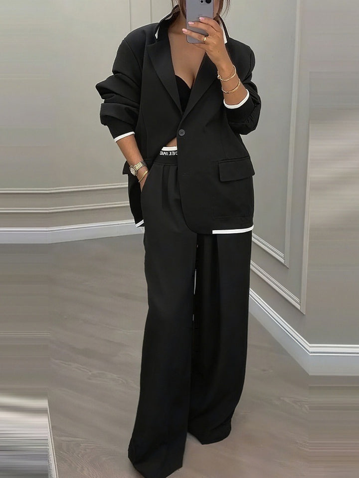Ensemble blazer et pantalon élégant pour femmes avec coupe large et design moderne Chic & Stil