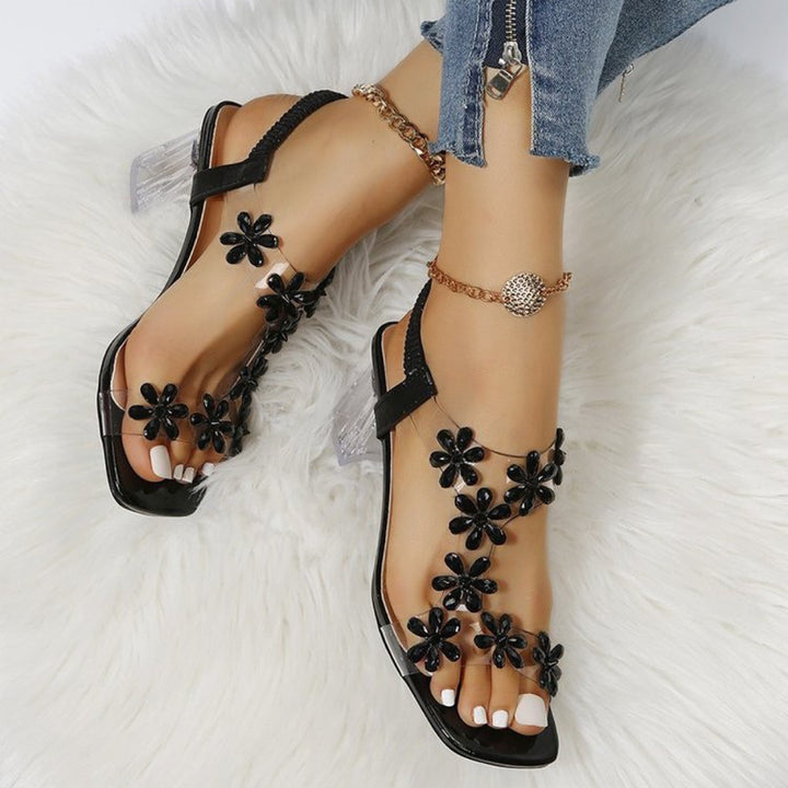 Women Glamour Sandals with transparent block heel and floral accents Lune London