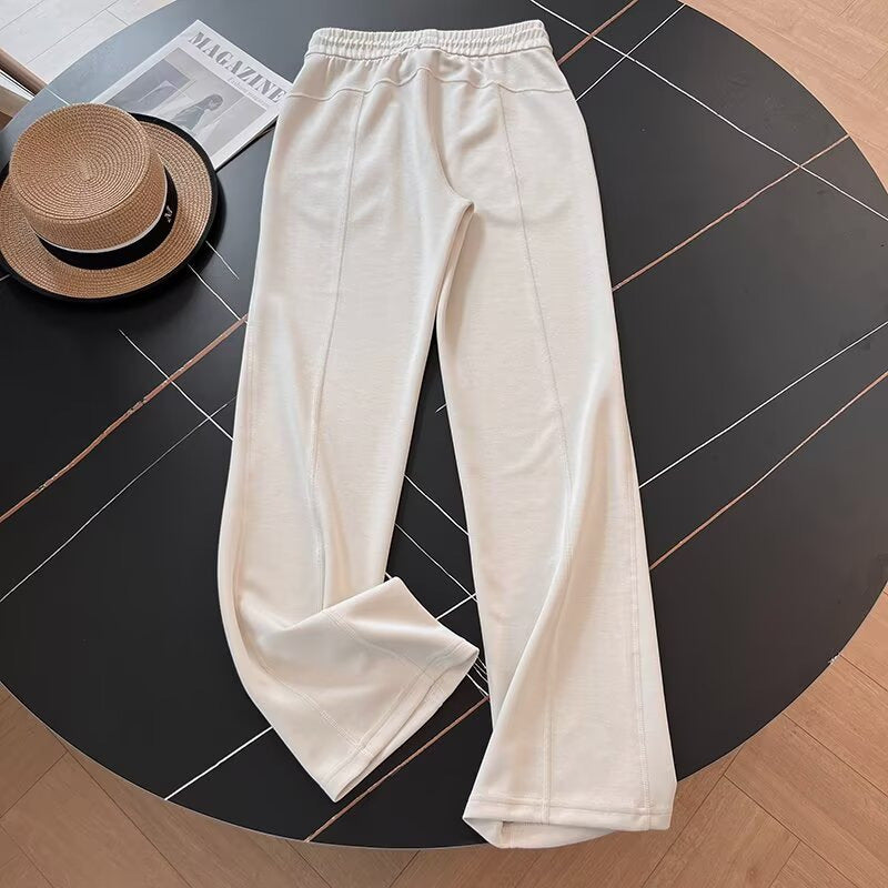 Pantalons de loisirs sportifs pour femmes avec taille élastique et poches latérales Chic & Stil
