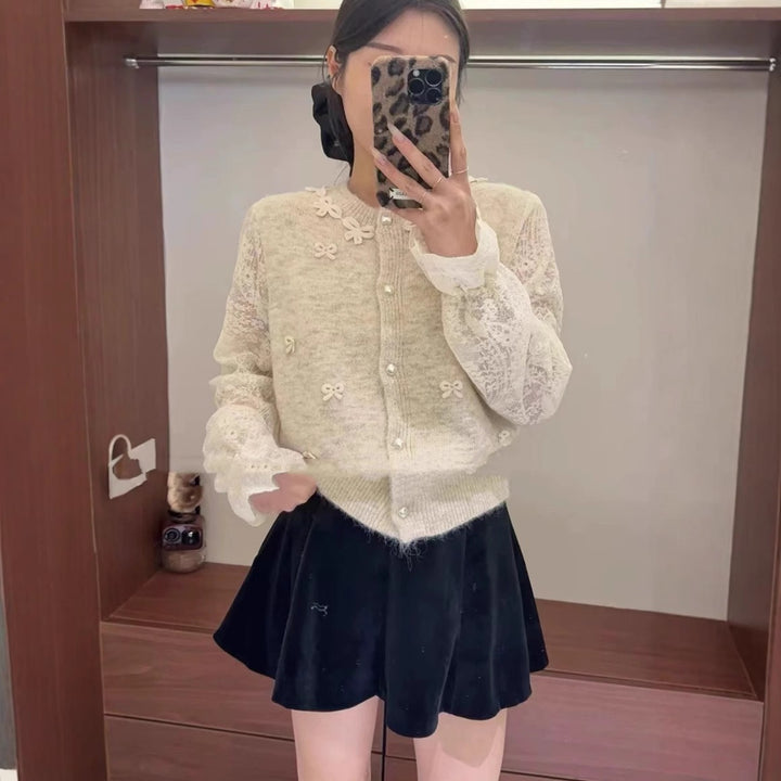 Women's knitted jacket with elegant lace details and a bow Lune London