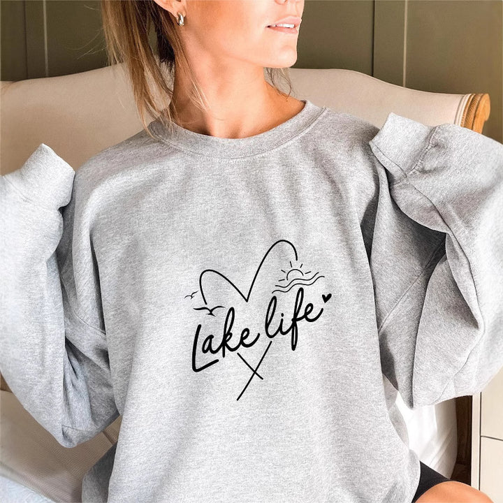 Sweatshirt pour femme avec des manches courtes et un motif en forme de cœur Chic & Stil