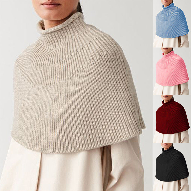 Knitted cape for women with high collar and fine rib structure Lune London