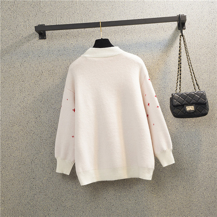 Women's Christmas sweater with festive reindeer pattern and comfortable round neck Lune London