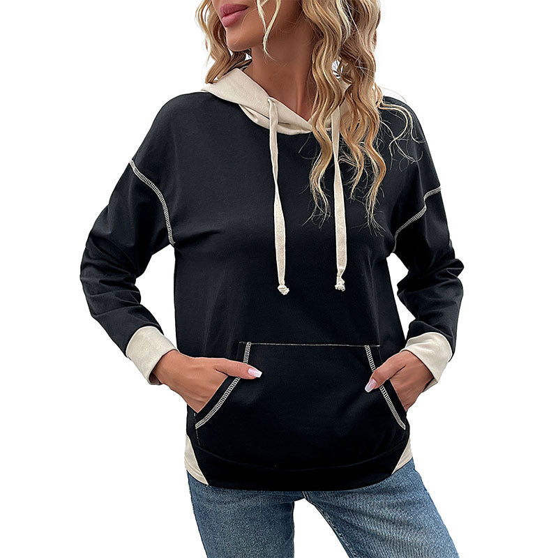 Casual hooded sweater for ladies with practical kangaroo pocket design Lune London