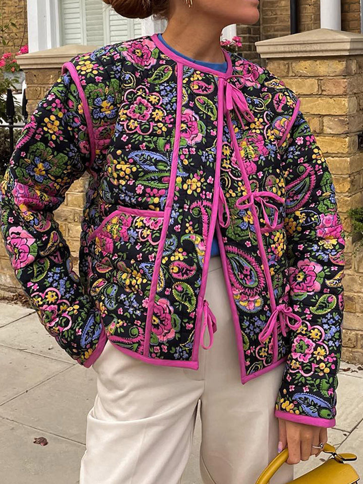 Ladies trendy quilted jacket with floral pattern and practical pockets Lune London