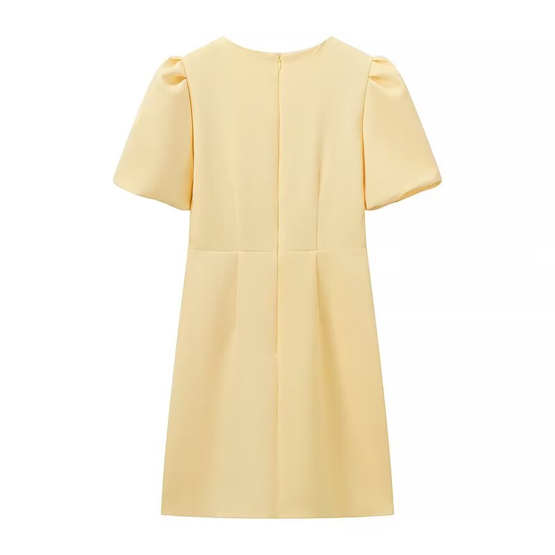 Dress for women with a fun ruffle design and elegant bow details Lune London