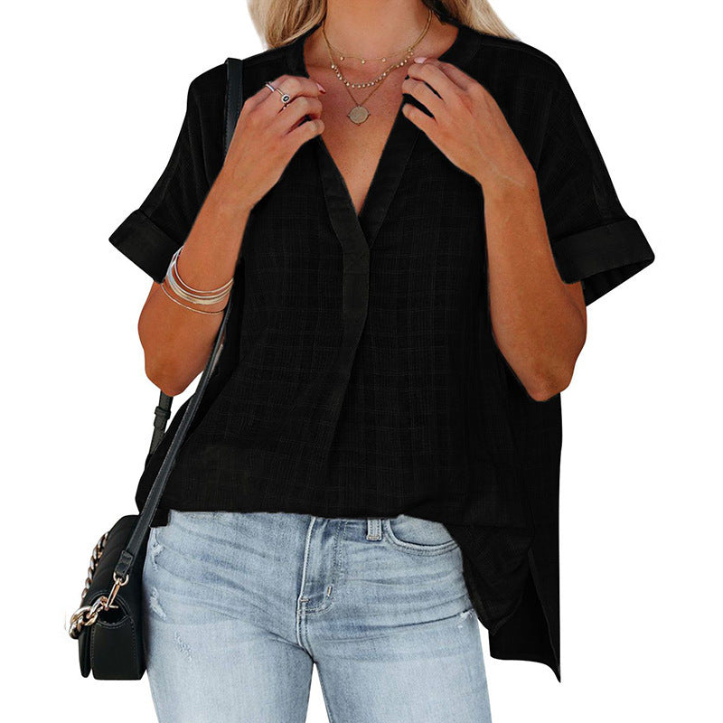 Casual short-sleeve blouse for women with a deep V-neckline and rolled sleeves Lune London