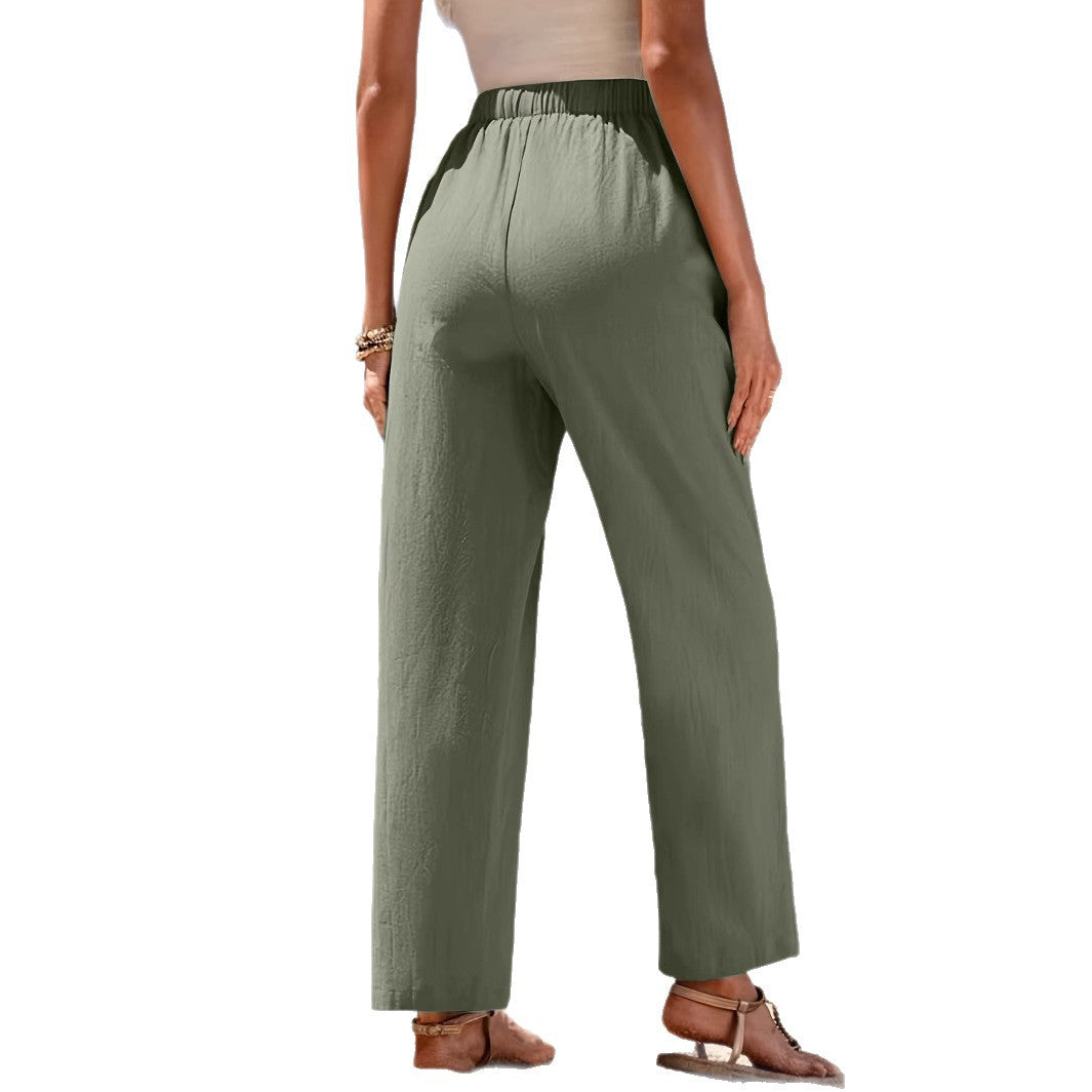 Loose beach pants for women with elastic waistband and practical pockets Lune London