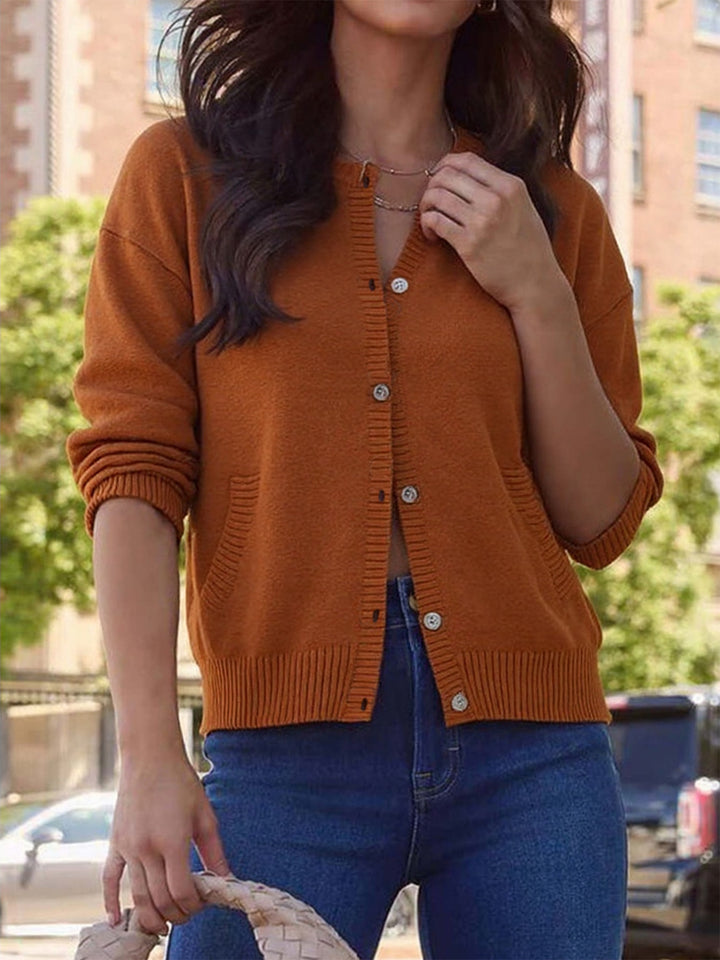 Elegant ladies cardigan with button details and practical pockets Lune London