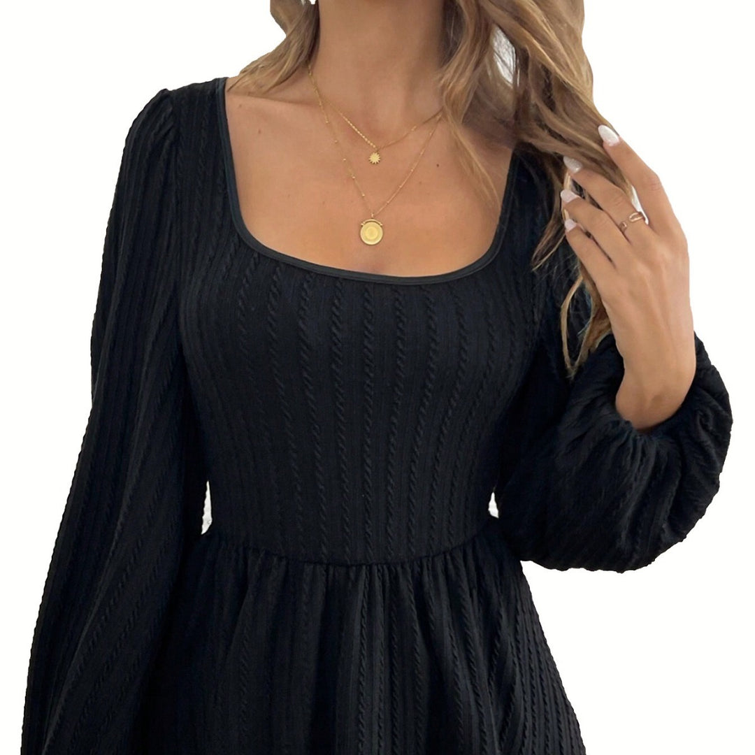 Haut à manches longues pour femmes avec de larges manches bouffantes et un attrayant col rond Chic & Stil