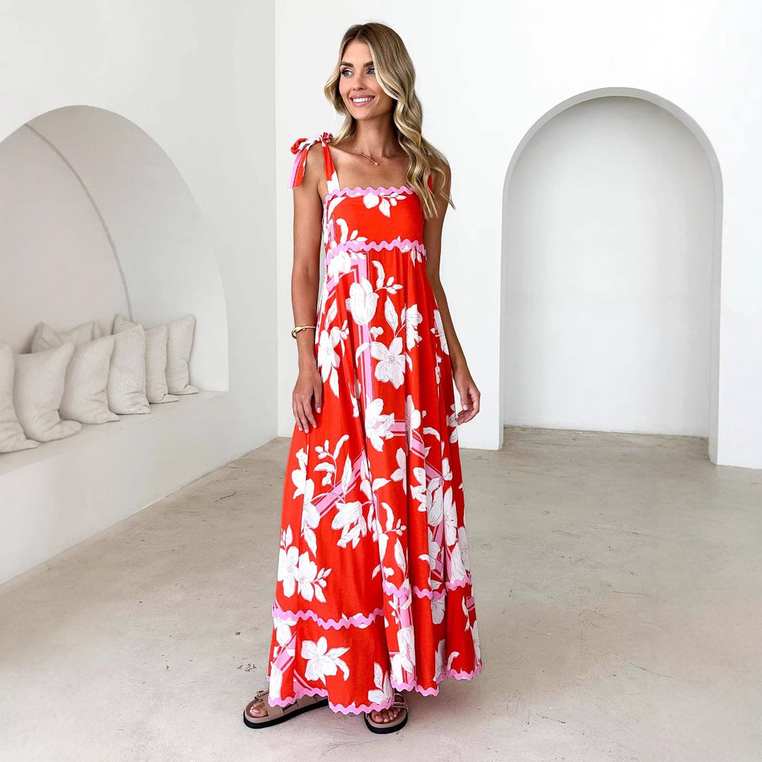 Maxi dress for women with a playful strap design and a chic & stylish print