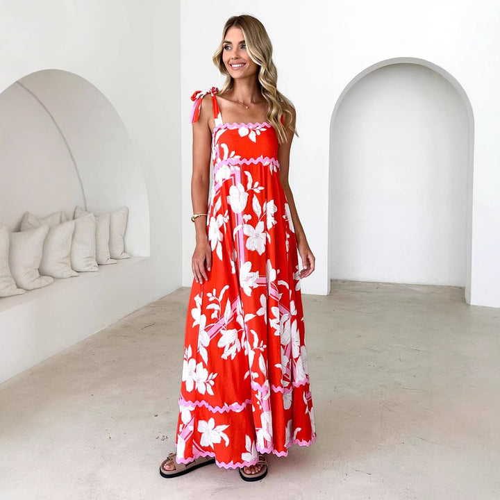 Maxi dress for women with a playful strap design and a chic & stylish print