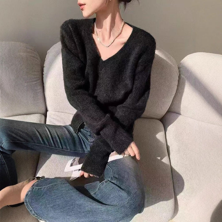 Cardigan féminin à la mode avec un décolleté en V profond et fermeture éclair Chic & Stil
