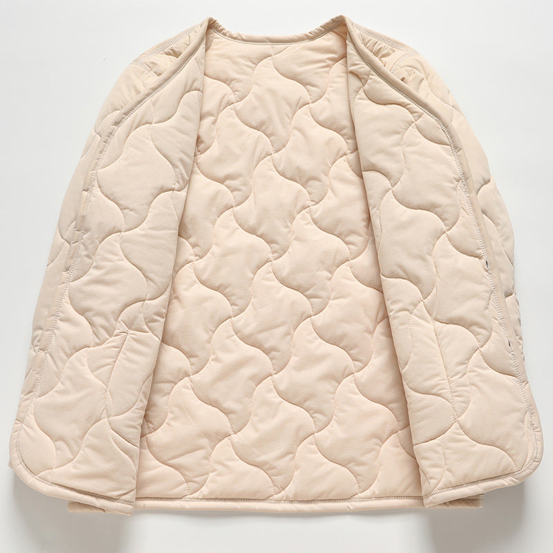 Ladies down jacket with practical pockets and button closure Lune London