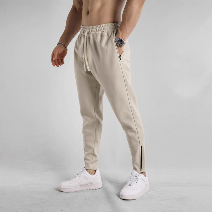 Sporty jogging pants for men with elastic waistband and side zip pockets Lune London