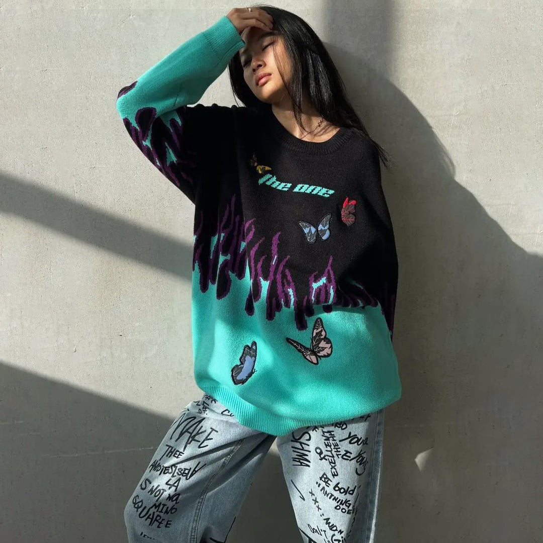 Chunky knit sweater for women with a unique design of flames and butterflies Lune London
