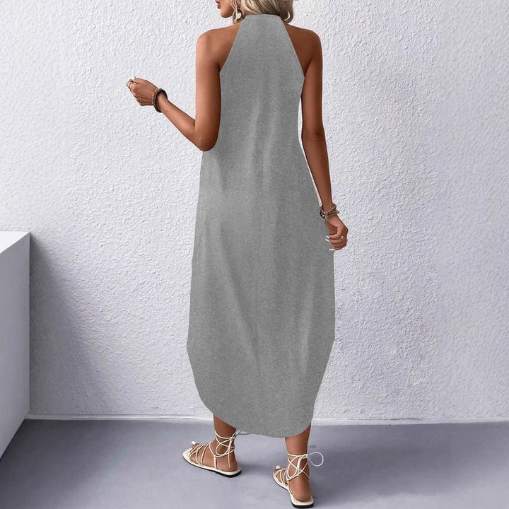 Casual summer maxi dress for women with an elegant backless design and practical pockets Lune London
