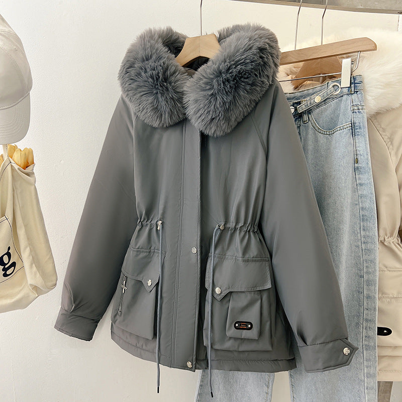 Multifunctional winter jacket for women with removable faux fur collar and adjustable waist drawstring Lune London
