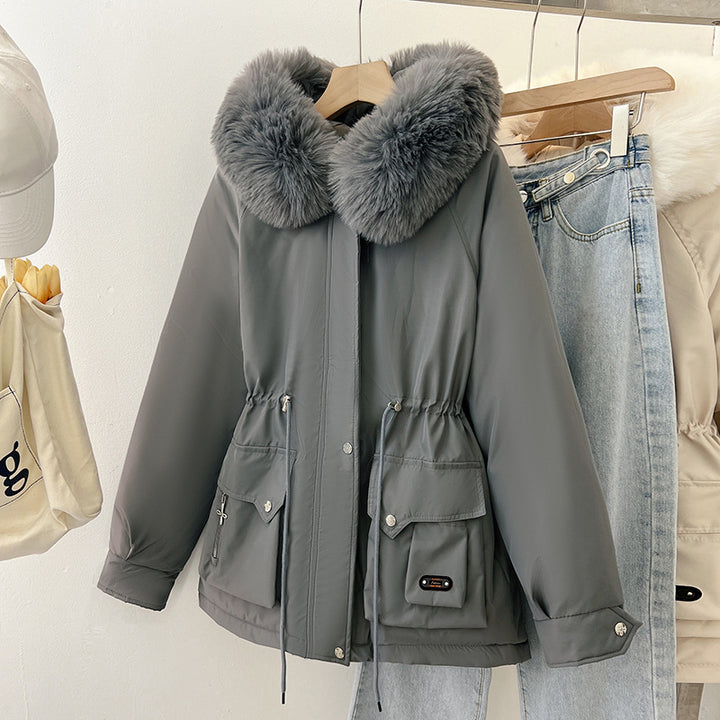 Multifunctional winter jacket for women with removable faux fur collar and adjustable waist drawstring Lune London