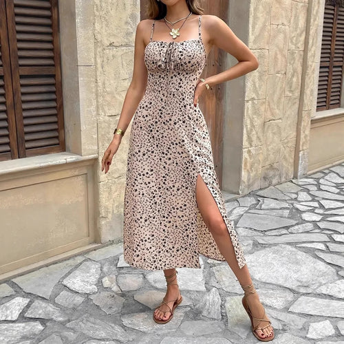 Maxi dress for women with a slim fit, a floral pattern and a side slit Lune London