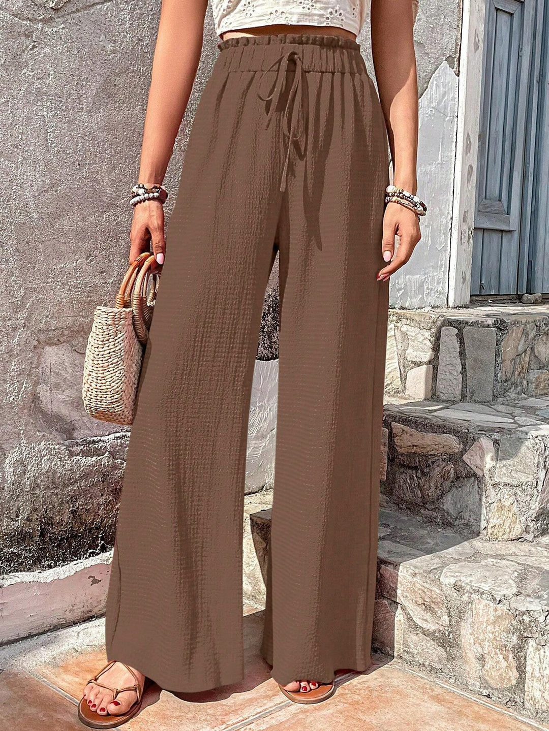 Loose summer pants for women with elastic waist and practical drawstring Lune London