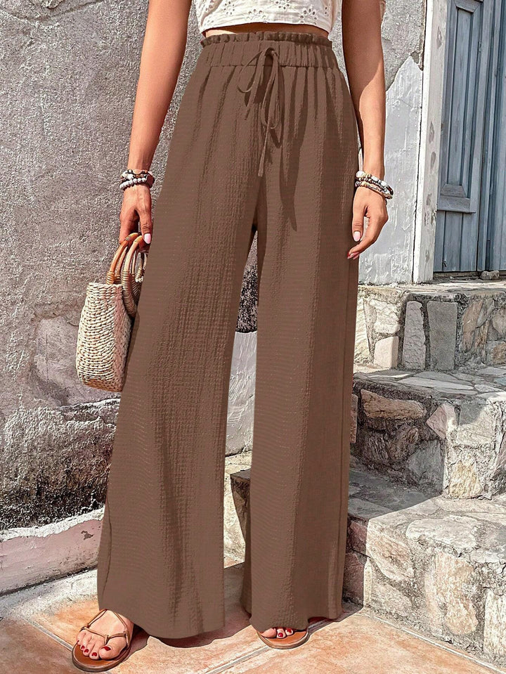Loose summer pants for women with elastic waist and practical drawstring Lune London