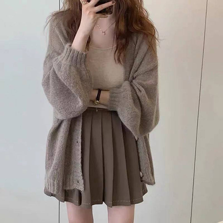 Ladies Cozy Knit Pullover with Voluminous Sleeves and Button Details Lune London