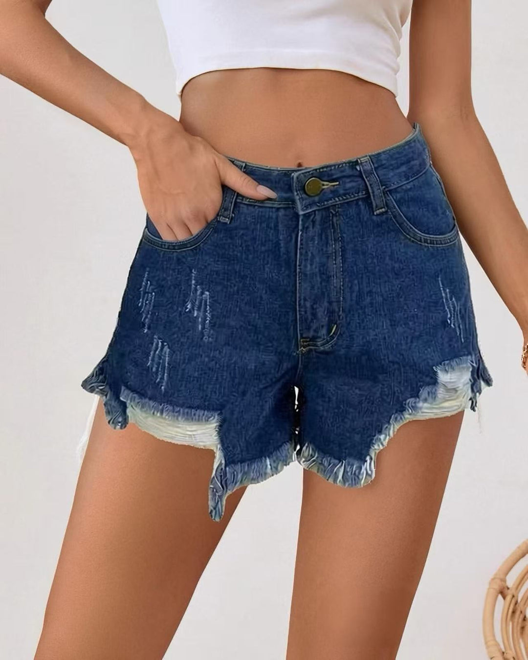 Women's fashionable destroyed denim shorts with frayed hem Lune London