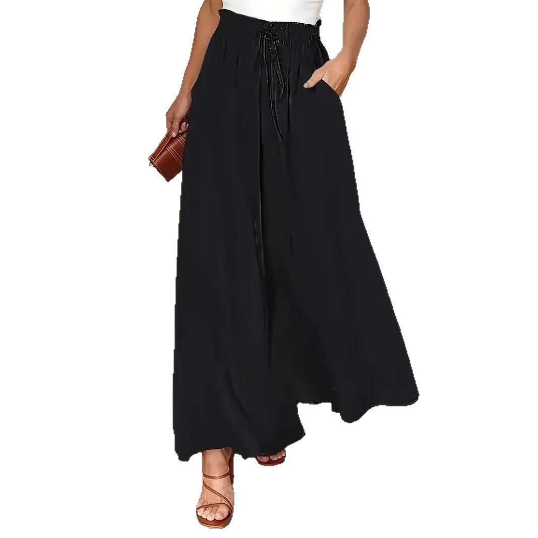 Ladies' culotte pants with elastic waist and embroidered polka dot pattern Lune London