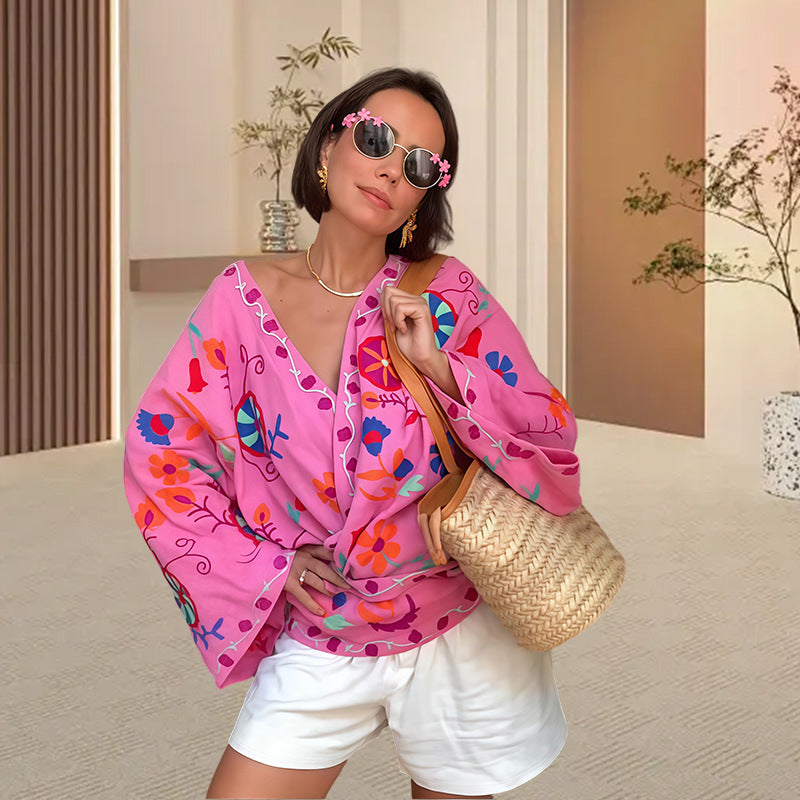 Ladies beach kimono with colorful floral pattern and relaxed fit Lune London