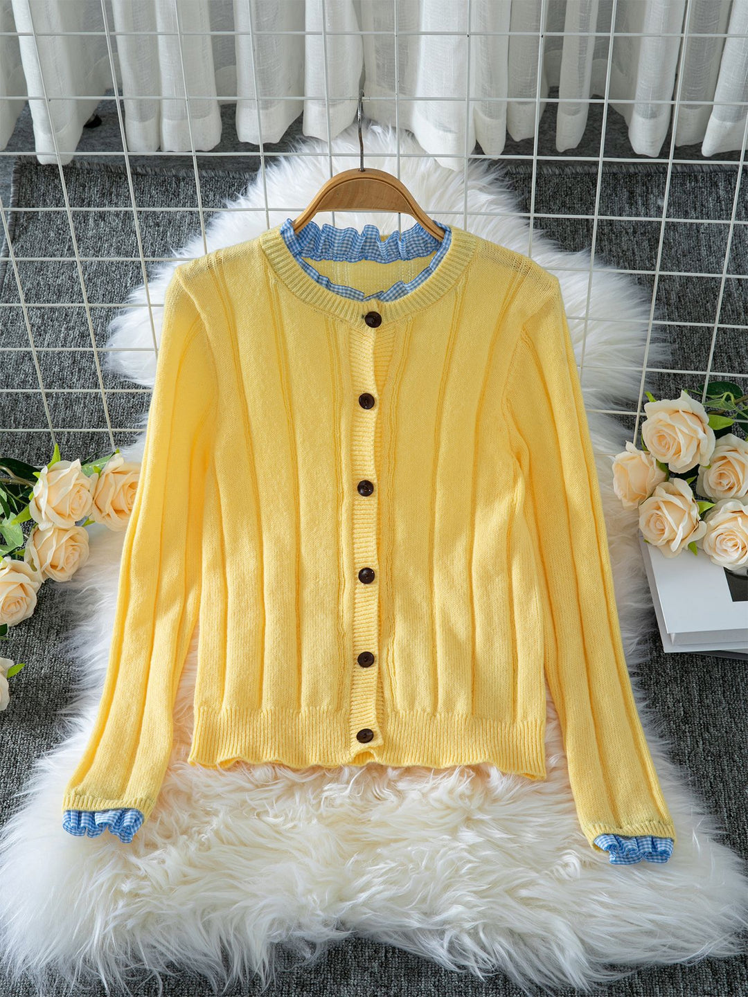 Women Lightweight knitted vest with pretty ruffled details Lune London