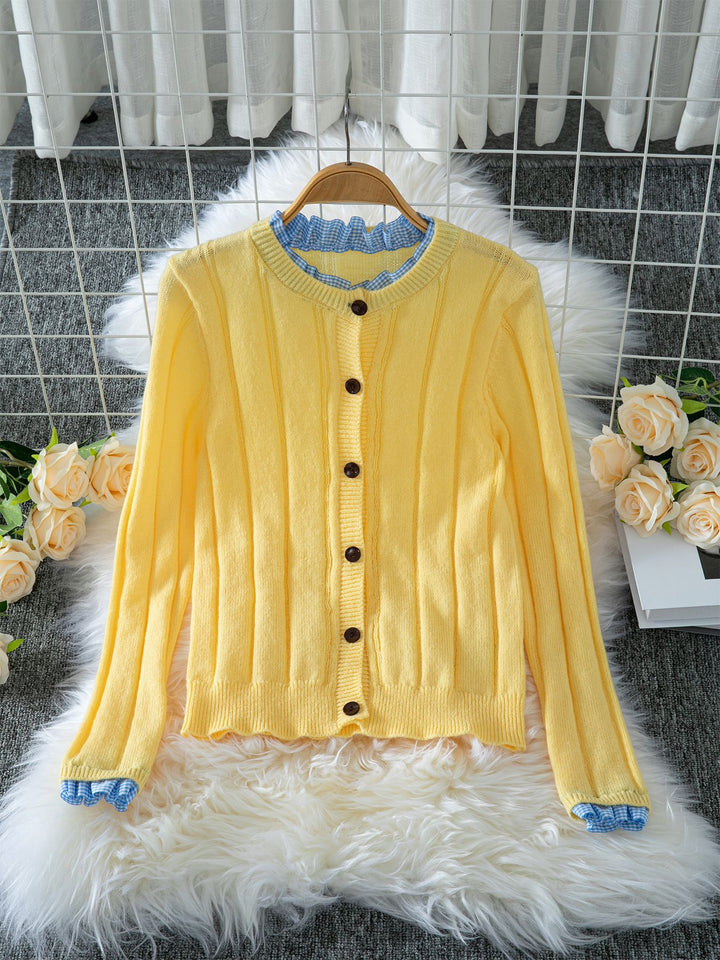 Women Lightweight knitted vest with pretty ruffled details Lune London