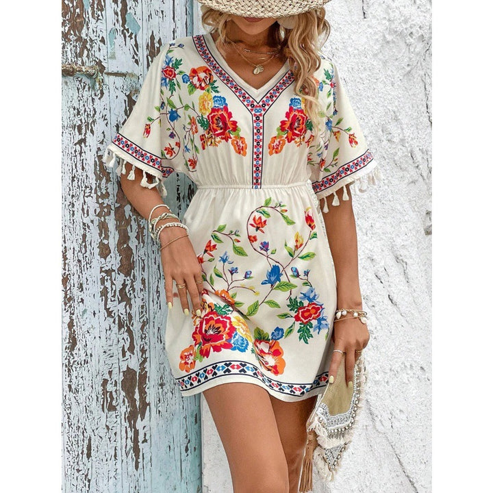 Casual women's dress with a floral design and fringe sleeves Lune London