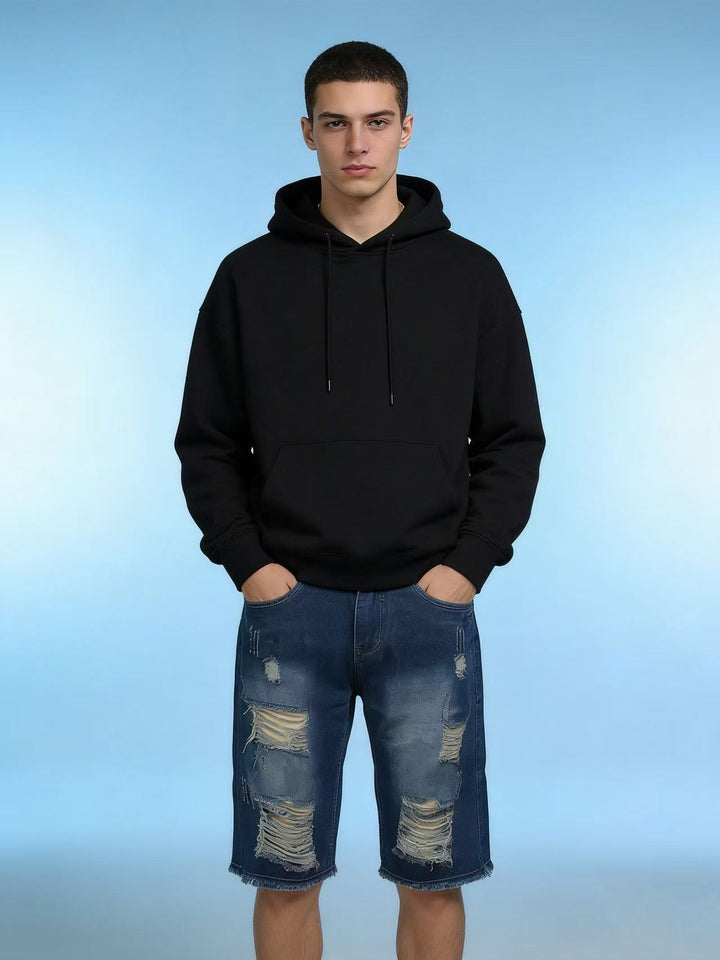 Men's casual destroyed denim shorts with frayed hems and wide legs Lune London