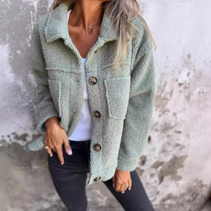 Ladies cozy faux fur coat with practical pockets Lune London