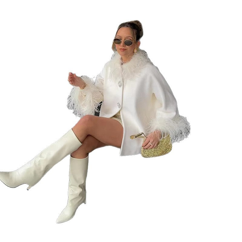 Manteau élégant féminin avec plumes Chic & Stil