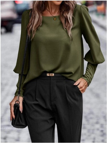 Elegant women's blouse with puff sleeve details and structured fabric Lune London