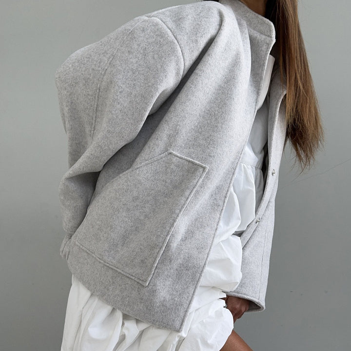 Oversized wool coat for women with simple button details and practical pockets Lune London